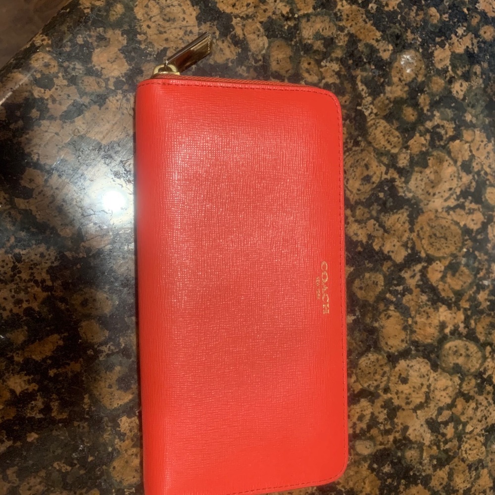 coral colored coach wallet